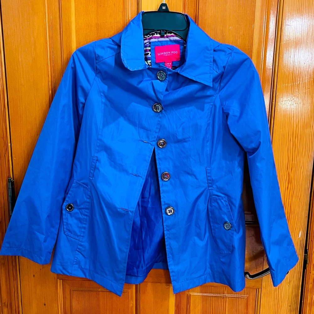 Periwinkle raincoat, all buttons there.